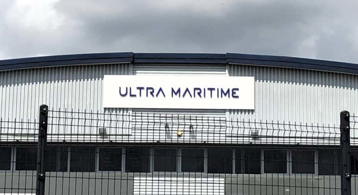 Exterior logo sign of Ultra Maritime on the warehouse